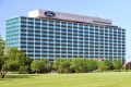 A photo showing the exterior of Ford World Headquarters in Dearborn, Michigan.