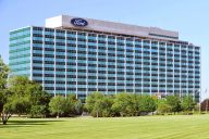 A photo showing the exterior of Ford World Headquarters in Dearborn, Michigan.