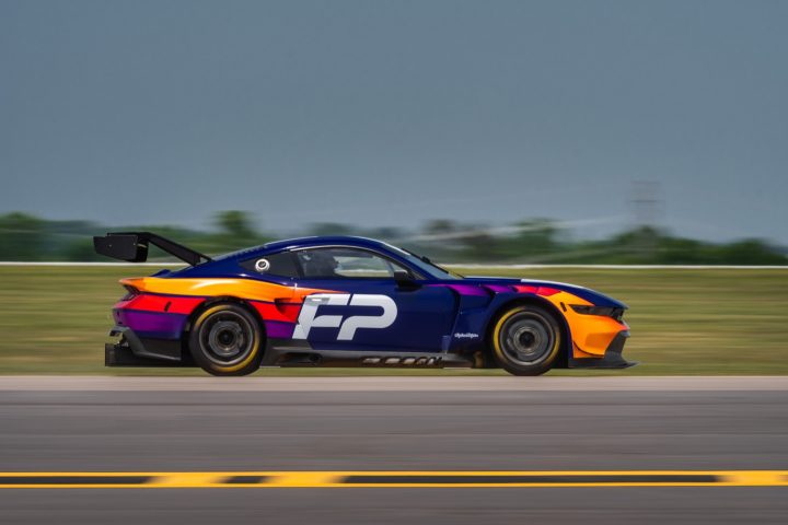A side view of the Ford Mustang GT3 on track. Proton Competition has struggled to produce results in 2025, but they're well on the way to success.