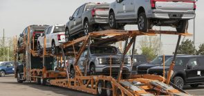 2023 Ford F-150 Lightning Delivery - Exterior 001 - Front and Rear Three Quarters
