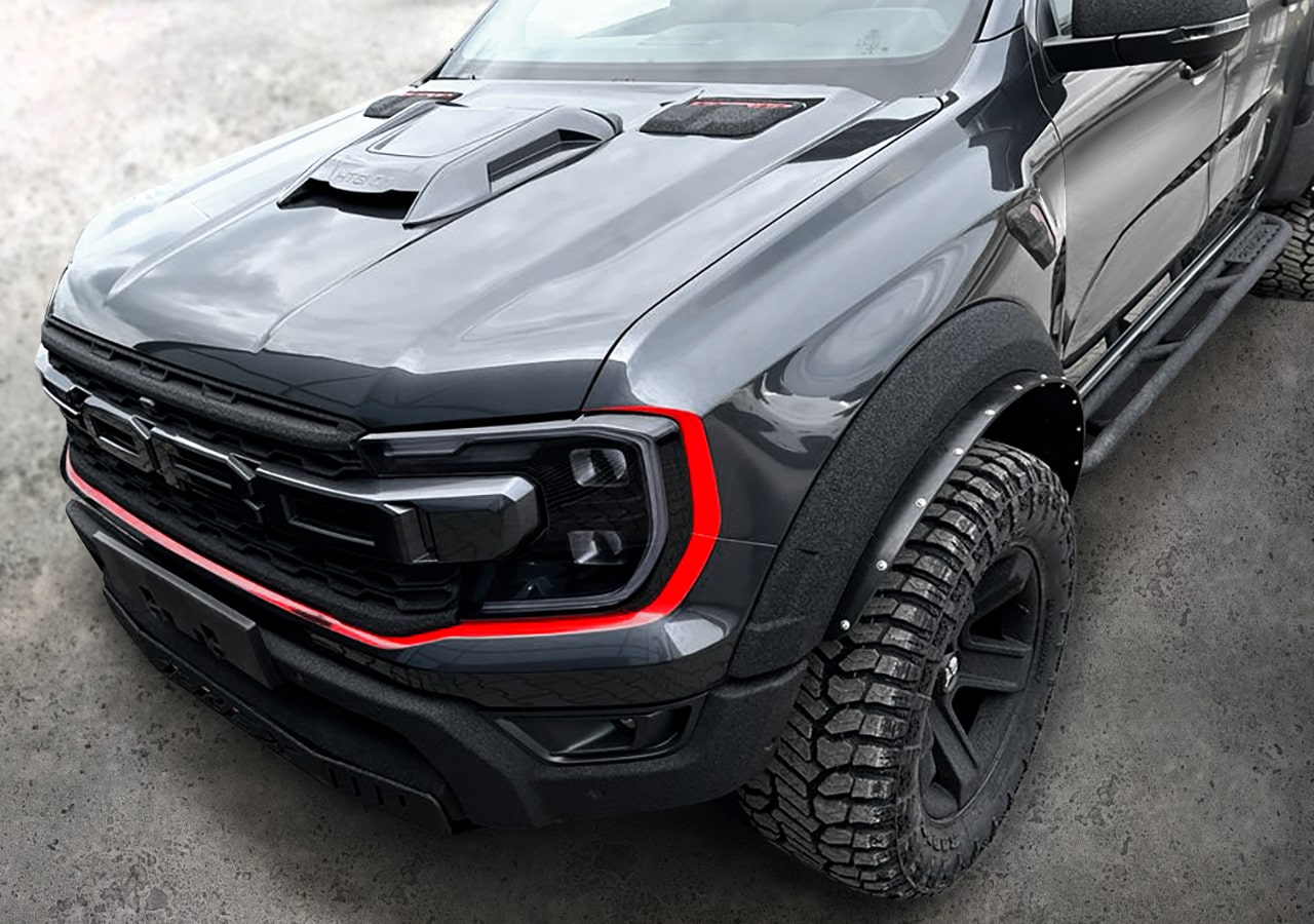 https://fordauthority.com/wp-content/uploads/2023/07/Carlex-Design-Ford-Ranger-Raptor-T-Rex-Package-Exterior-002-Front-Three-Quarters.jpg