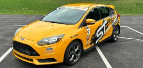 Octane Academy 2014 Ford Focus ST - Exterior 001 - Front Three Quarters