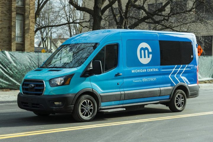 Ford E-Transit Electreon Wireless Charging Road Pilot Michigan Central Station - Exterior 001 - Front Three Quarters