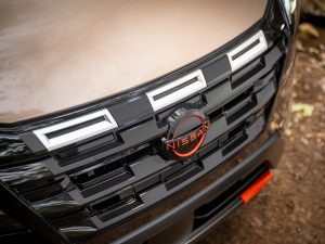 A photo showing a closeup of the 2025 Nissan Rogue Rock Creek Edition front end.