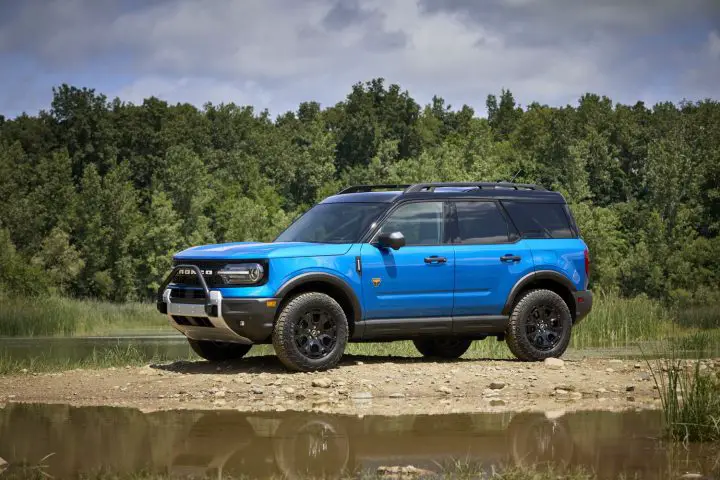 Photo showing a side view of the 2025 Ford Bronco Sport viewed from a front three-quarters angle. Dyrt has partnered with Ford to promote the Bronco Sport.