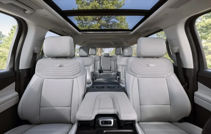 A photo showing the interior of the 2025 Ford Expedition Platinum Ultimate, featuring multicontour front seats. 