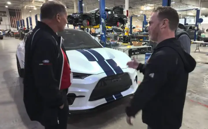 Screenshot of the video showing the 2021 Ford Shelby Mustang Mach-E creators speaking about the EV in the Shelby shop in Las Vegas.