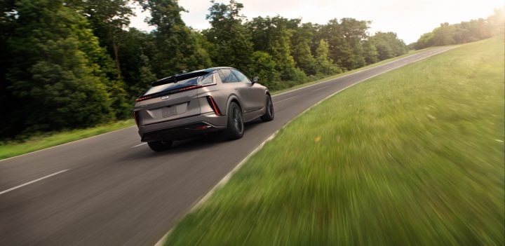 A photo showing the exterior of the 2026 Cadillac Lyriq from a rear three quarters angle.