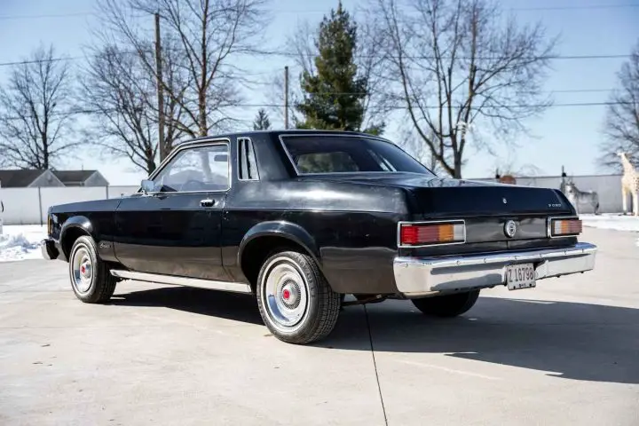 A photo showing the exterior of a 1978 Ford Granada from a rear three quarters angle. 