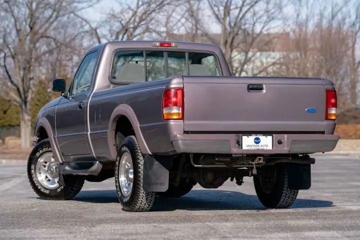 A photo showing the exterior of a 1997 Ford Ranger XLT from a rear three quarters angle.