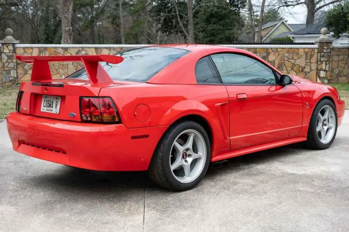 A photo showing the exterior of a 2000 Ford Mustang SVT Cobra R from a rear three quarters angle.