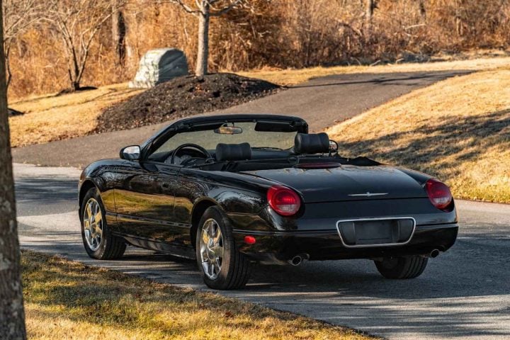 A photo showing the exterior of a 2002 Ford Thunderbird from a rear three quarters angle.