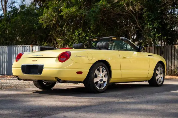 A photo showing the exterior of a 2002 Ford Thunderbird from a rear three quarters angle.