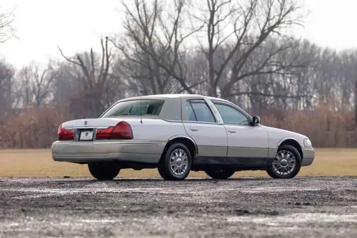 A photo showing the exterior of a 2005 Mercury Grand Marquis from a rear three quarters angle.