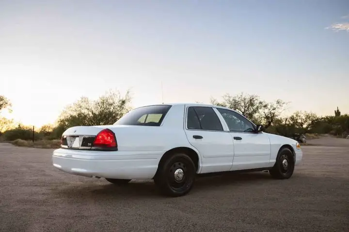 A photo showing the exterior of a 2009 Ford Crown Victoria Police Interceptor from a rear three quarters angle.