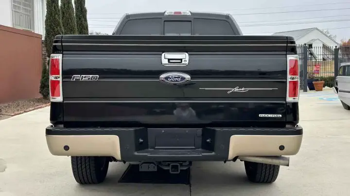 A photo showing the exterior of a 2013 Ford F-150 from a rear angle.