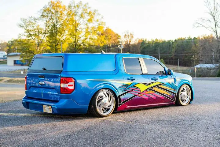 A photo showing the exterior of a 2022 Ford Maverick SEMA build from a rear three quarters angle.
