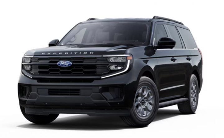 Photo showing the Grille with Carbon Black molded-in-color (MIC) surround with ebony painted bars, which is standard on the 2025 Ford Expedition Active. There are five unique grilles offered on the SUV. 