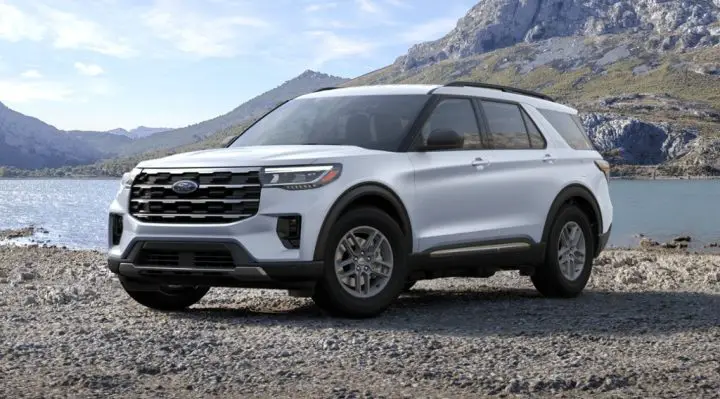 Photo of the 2025 Ford Explorer in front three quarters view. There are four unique grilles offered for this crossover.