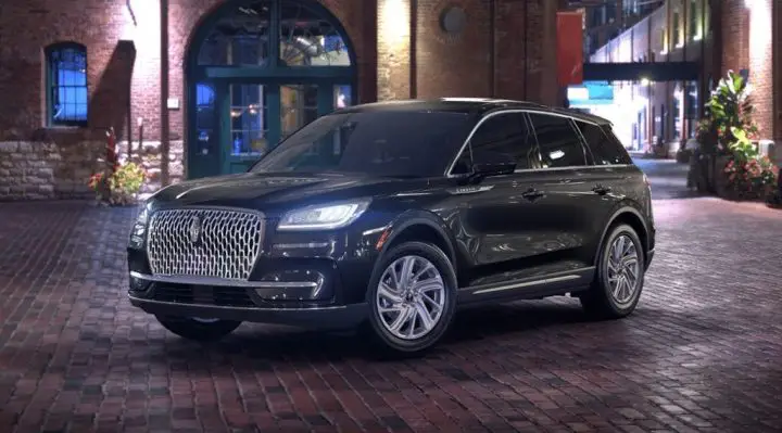 Photo of the 2025 Lincoln Corsair Premiere, shown from a front three quarters view. Each trim level has a unique grille available.