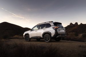 A photo showing the exterior of the 2026 Subaru Forester Wilderness from a rear three quarters angle.