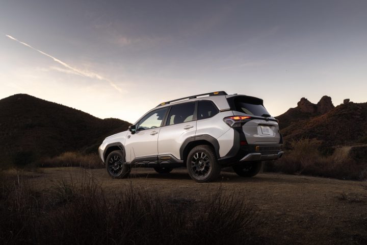 A photo showing the exterior of the 2026 Subaru Forester Wilderness from a rear three quarters angle.
