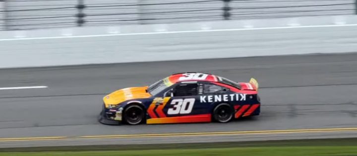 Video still of the No. 30 NASCAR Ford Mustang of Cleetus McFarland on track at Daytona. He would finish 30th after wrecking out. 