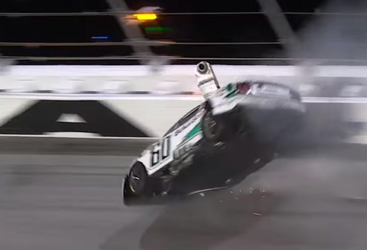 Video still of the No. 60 NASCAR Ford of Ryan Preece during a wreck during the 2025 Daytona 500, showing it from a rear three quarters view. 