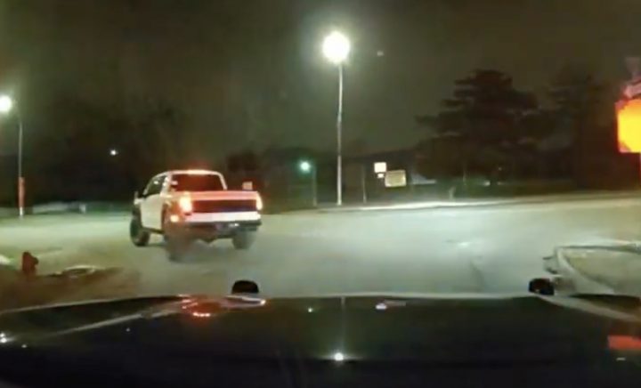 A photo showing the exterior of a 2025 Ford F-150 Raptor R from a rear three quarters angle.