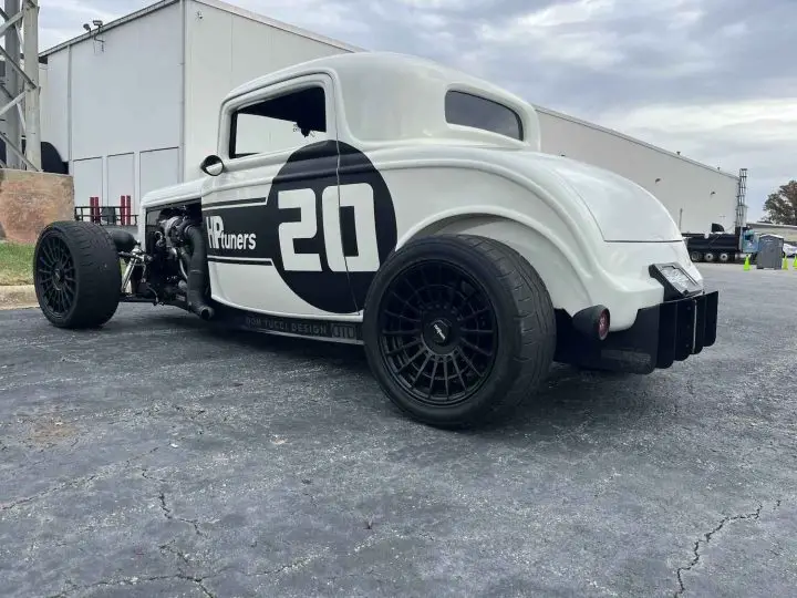 A photo showing the exterior of a V6 EcoBoost powered 1932 Ford coupe from a rear three quarters angle.