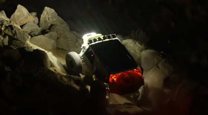 Video still of Vaughn Gittin Jr. driving the Ultra4 Ford Bronco up a rocky canyon wall. He would roll the SUV shortly afterward, but it wasn't too damaged.