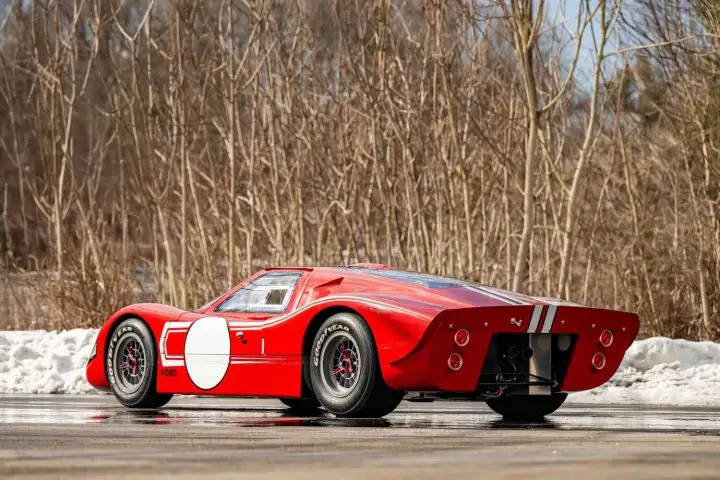 A photo showing the exterior of a 1967 Ford GT40 G7A Mark IV conversion from a rear three quarters angle.