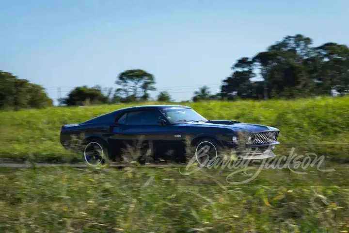 A photo showing the exterior of a 1969 Ford Mustang formerly owned by Keith Urban from a front three quarters angle.