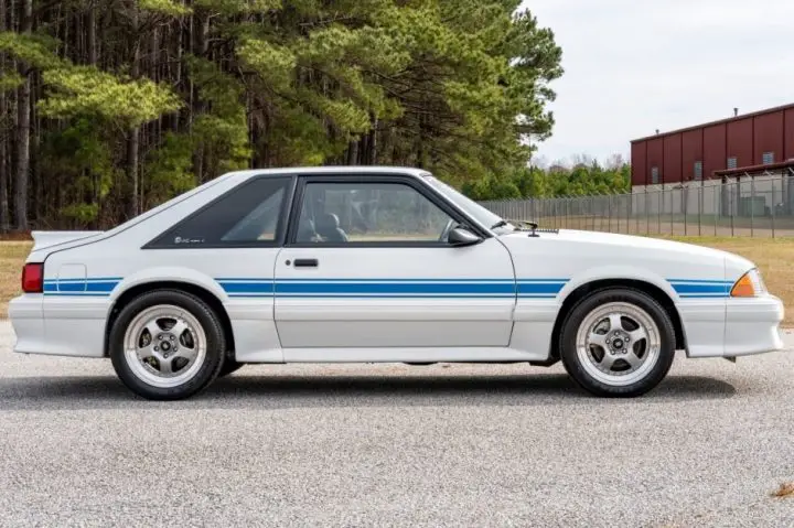 A photo showing a side view of the 1991 Ford Mustang SAAC MK1 up for sale. This vehicle is rare, just one of 65 made. 