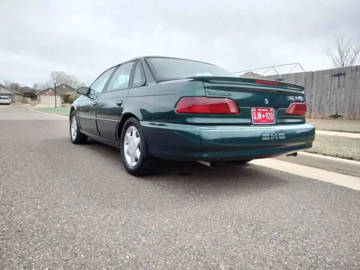 A photo showing the exterior of the 1995 Ford Taurus SHO from a rear three quarters angle.