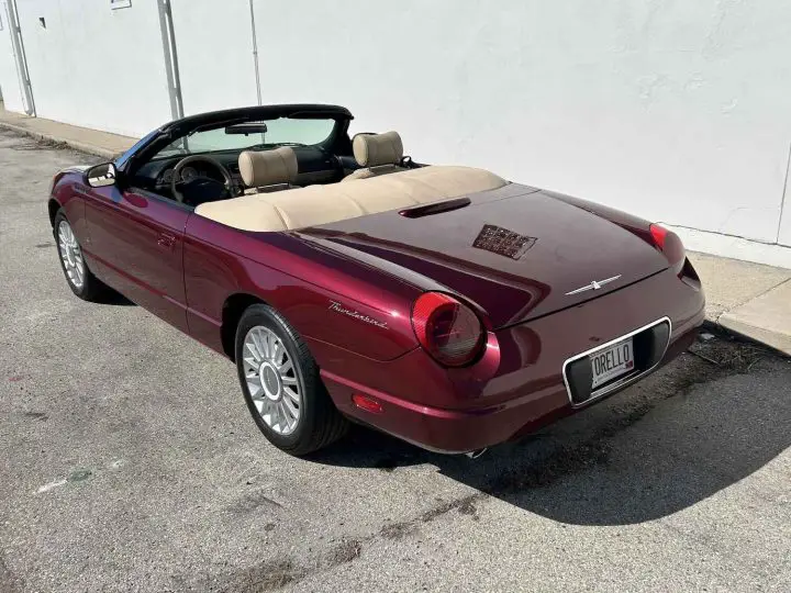 A photo showing the exterior of a 2004 Ford Thunderbird from a rear three quarters angle.