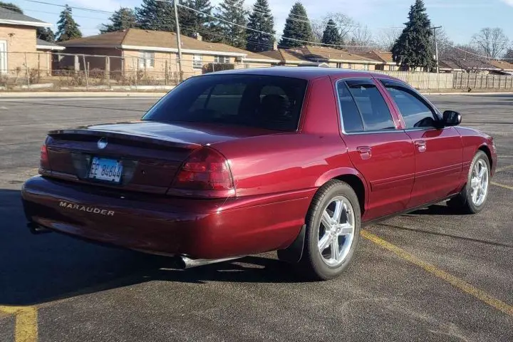 A photo showing the 2004 Mercury Marauder from a rear three quarters angle.