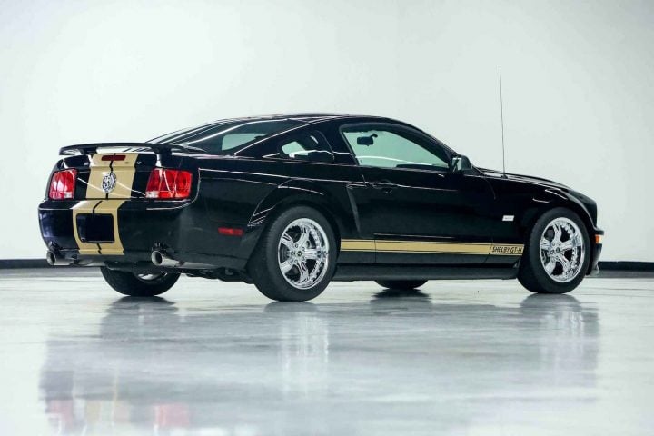 A photo showing the exterior of a 2006 Ford Mustang Shelby GT-H from a rear three quarters angle.