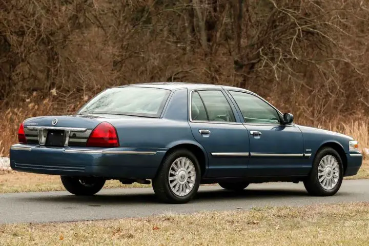 A photo showing the exterior of a 2009 Mercury Grand Marquis from a rear three quarters angle.