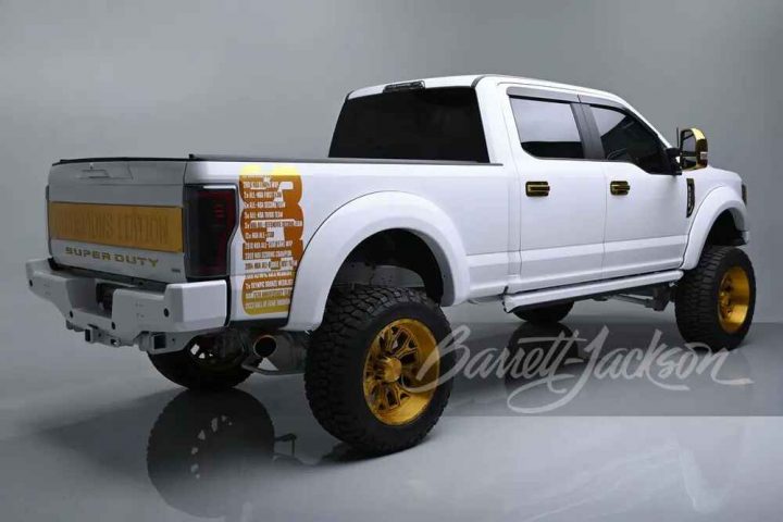 A photo showing the exterior of a 2017 Ford F-250 Dwayne Wade Champions Edition pickup from a rear three quarters angle.