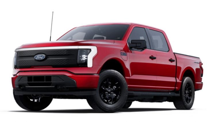 Photo of the 2025 Ford F-150 Lightning XLT wearing the Carbon Black front grille. This is one of two grilles offered on the electric pickup.