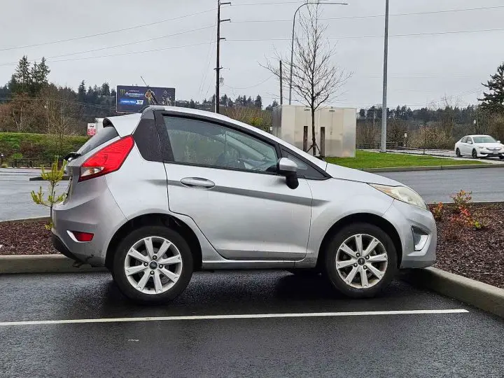 A photo showing the exterior of a chopped 2011 Ford Fiesta from a side angle.