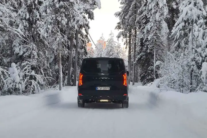 A photo showing the exterior of the Ford E-Tourneo from a rear angle.