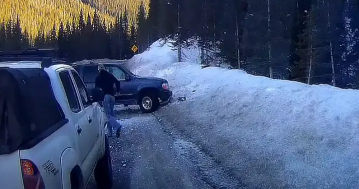 Video still of the Ford Explorer after it hit a patch of black ice and flipped several times. The original poster stated that the driver was okay after the crash. 