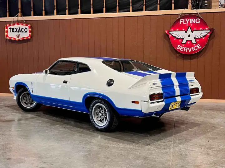 A photo showing the exterior of a 1978 Ford Falcon XC Cobra 302 from a rear three quarters angle.