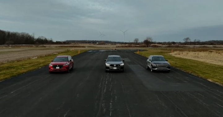 Video still of the 2025 Lincoln Aviator, Genesis GV80, and Acura MDX on track together. The Aviator makes the most power of the three luxury crossovers.