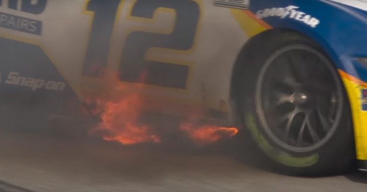 Video still of flames coming out of the exhaust outlets of the No. 12 NASCAR Ford Mustang, which blew up after leading the most laps at Homestead.