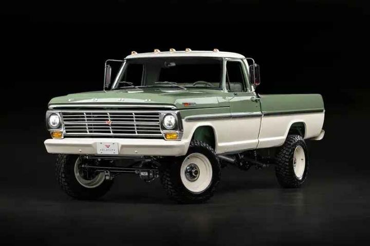 A photo showing the exterior of a 1971 Ford F-250 built for Post Malone by Velocity Restorations from a front three quarters angle.