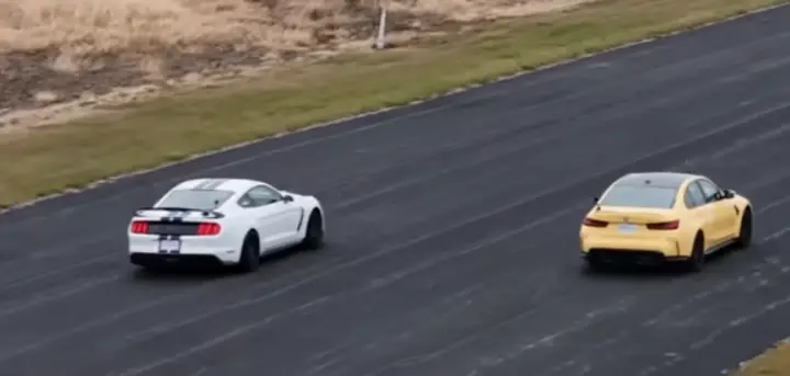 Video still of the Ford Mustang Shelby GT350R on track against the BMW M3. The BMW just didn't have anything on the Mustang. 