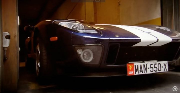 Video still of the Ford GT leaving the parking garage. The GT, the Ferrari, and the Zonda had problems leaving the garage thanks to their low clearance.